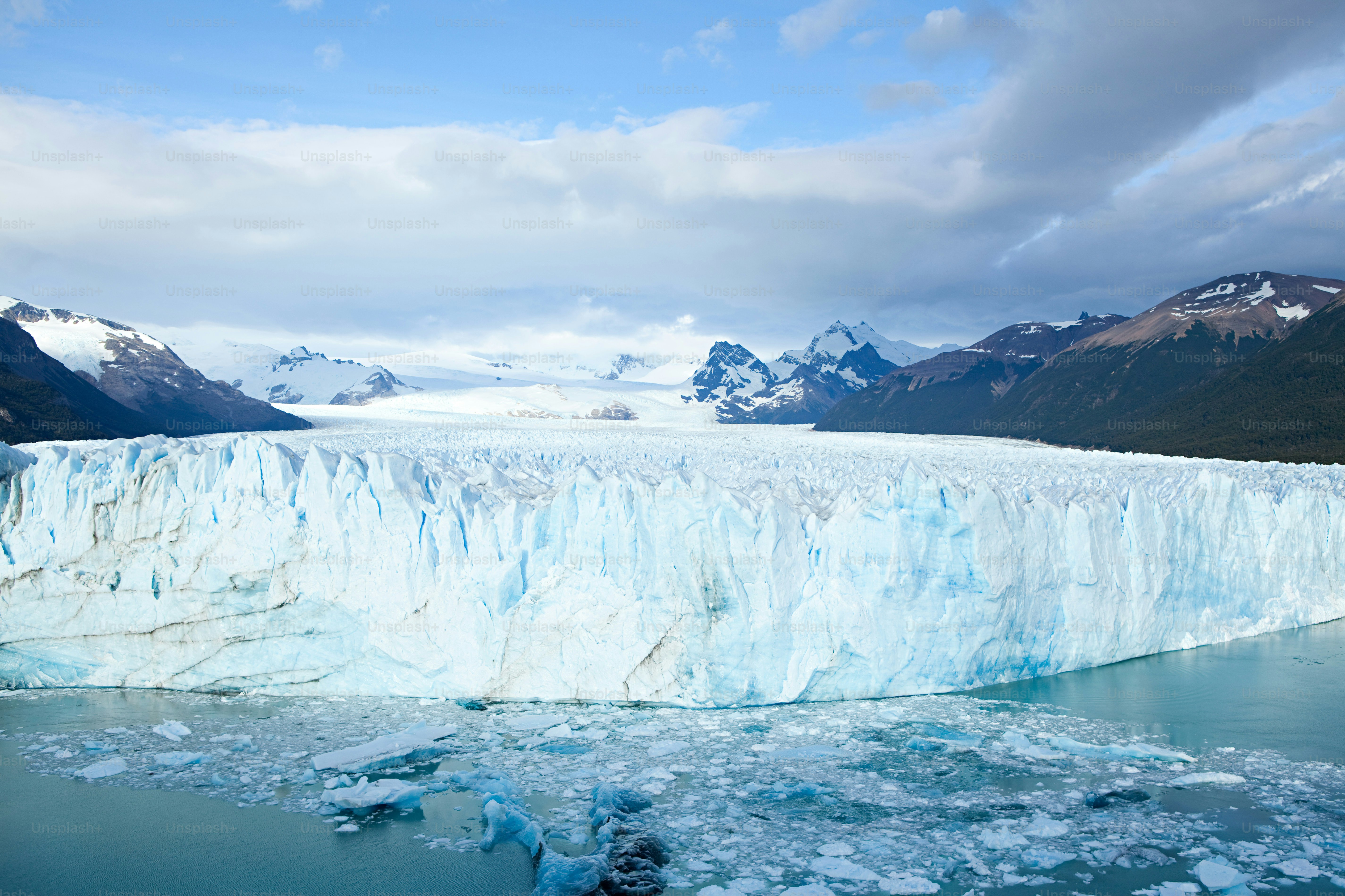 a large iceberg in the middle of a body of water