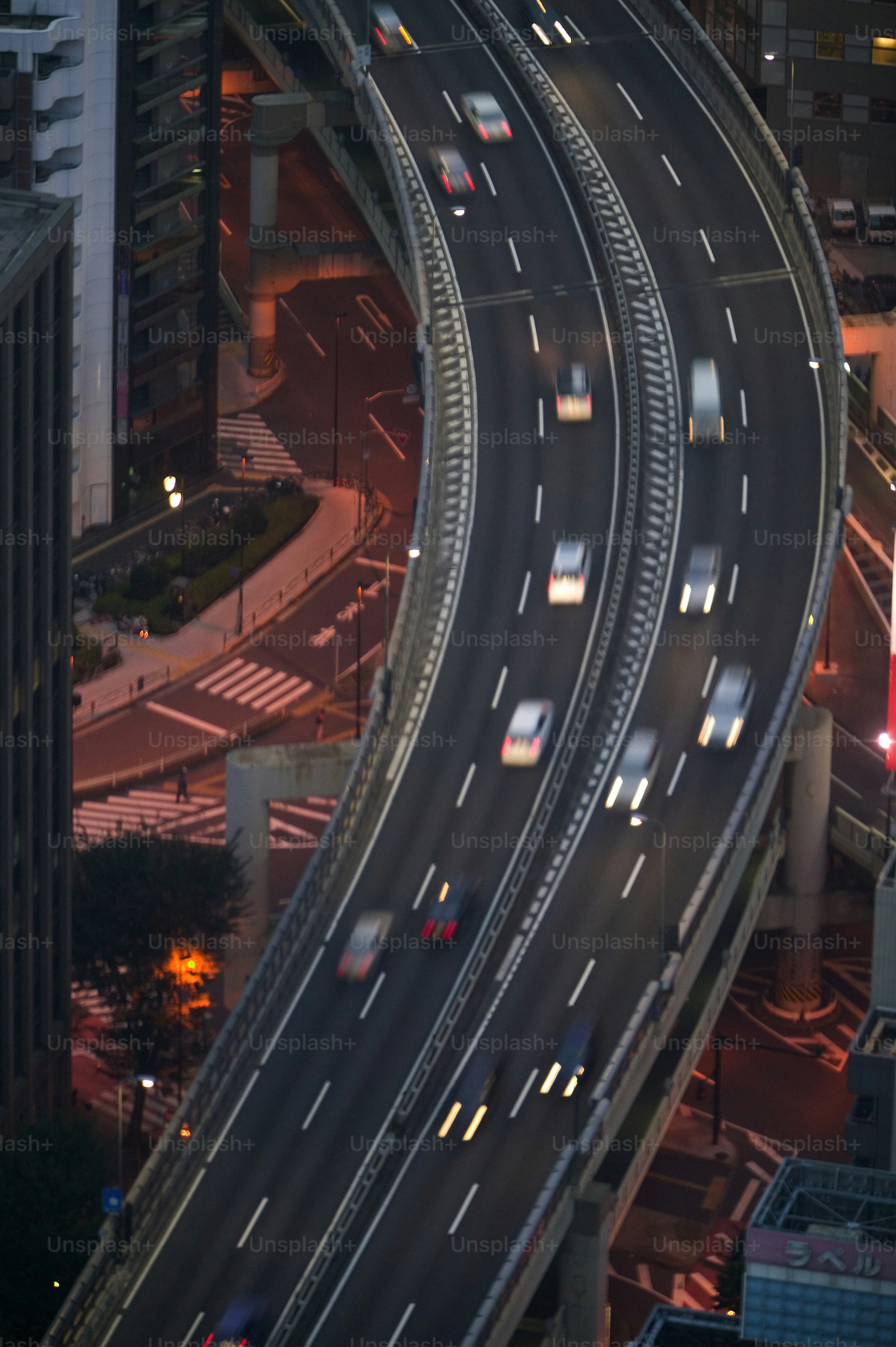 a highway with a bunch of cars driving on it