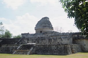 a very large building with a tower in the middle of it