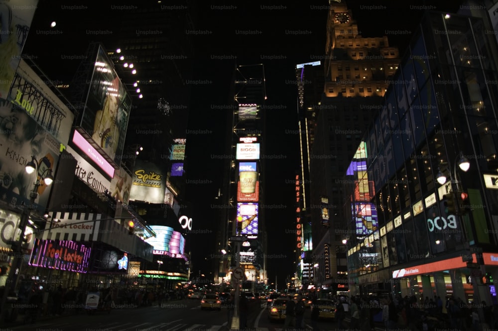 a city street filled with lots of tall buildings