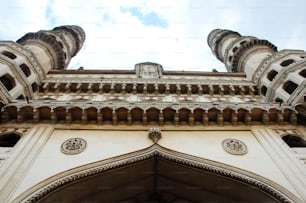 a tall building with a clock on the top of it