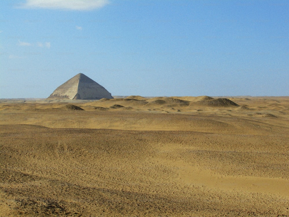 a large pyramid in the middle of a desert