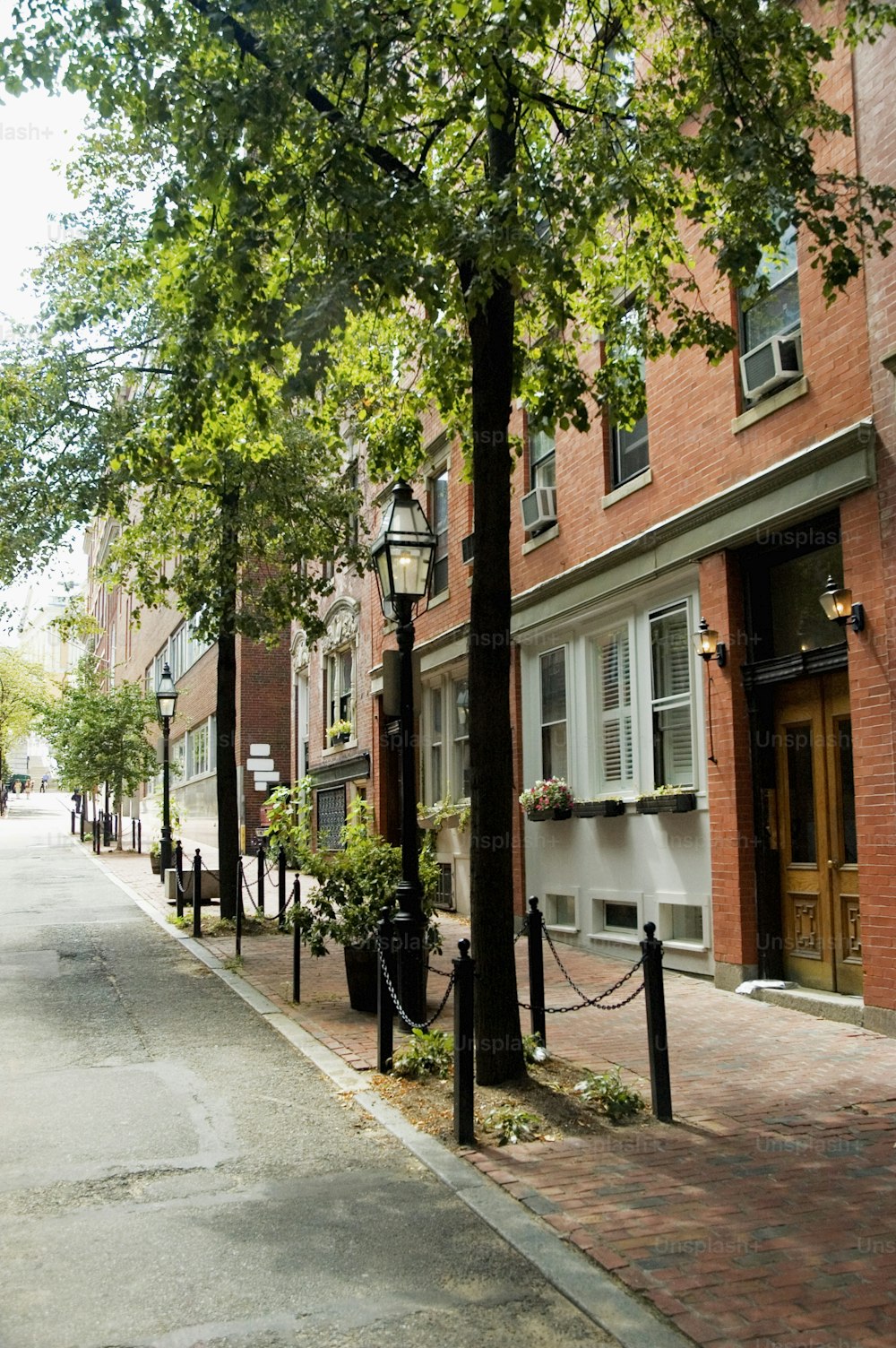 a row of brick buildings on a city street