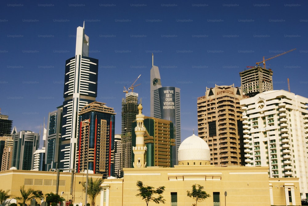 a group of tall buildings in a city