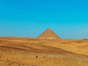 a large pyramid in the middle of a desert