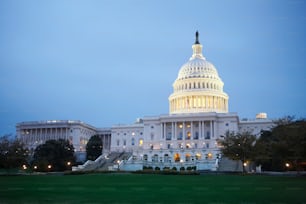 the u s capitol building lit up at night