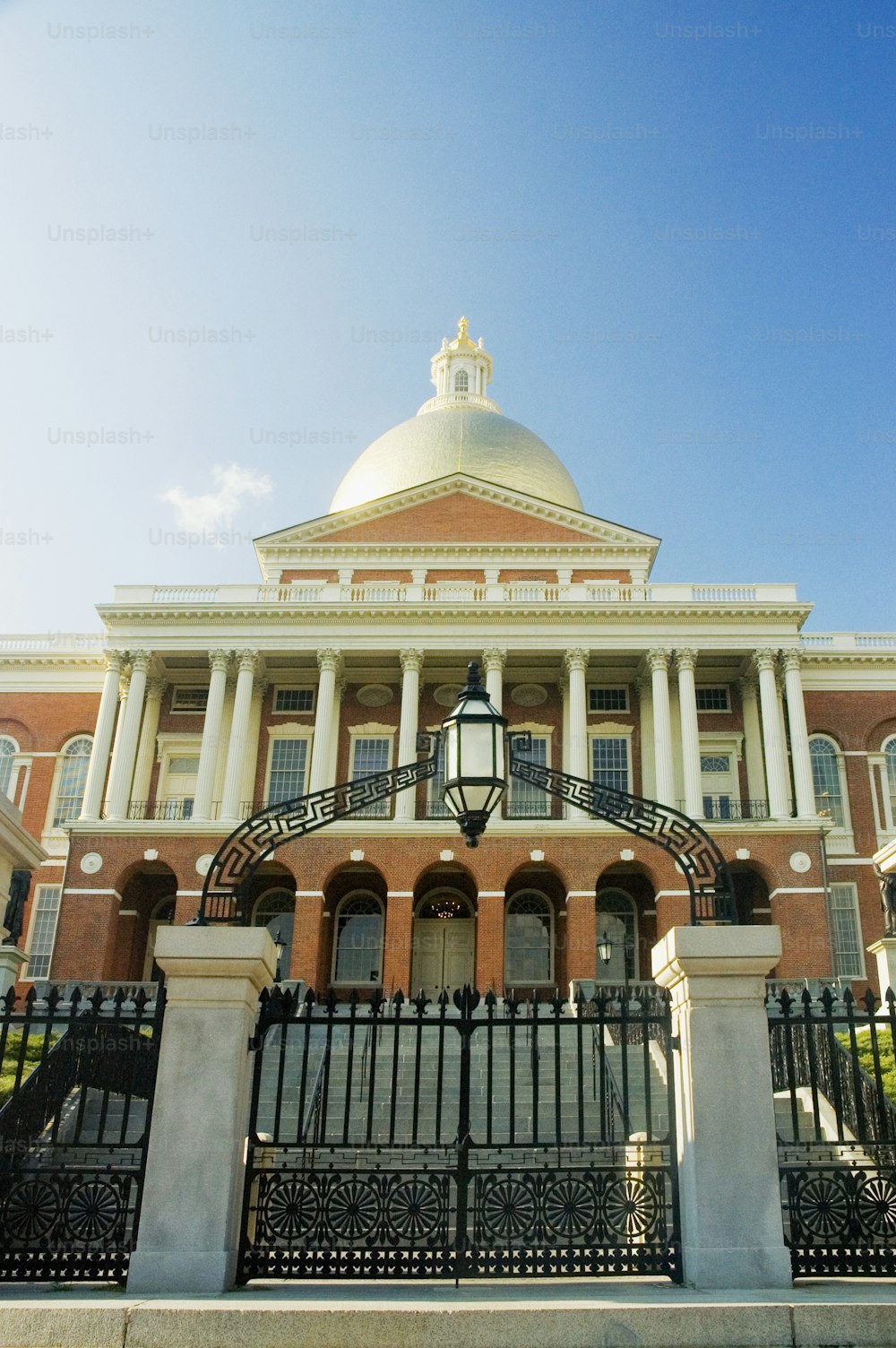 a large building with a gate in front of it