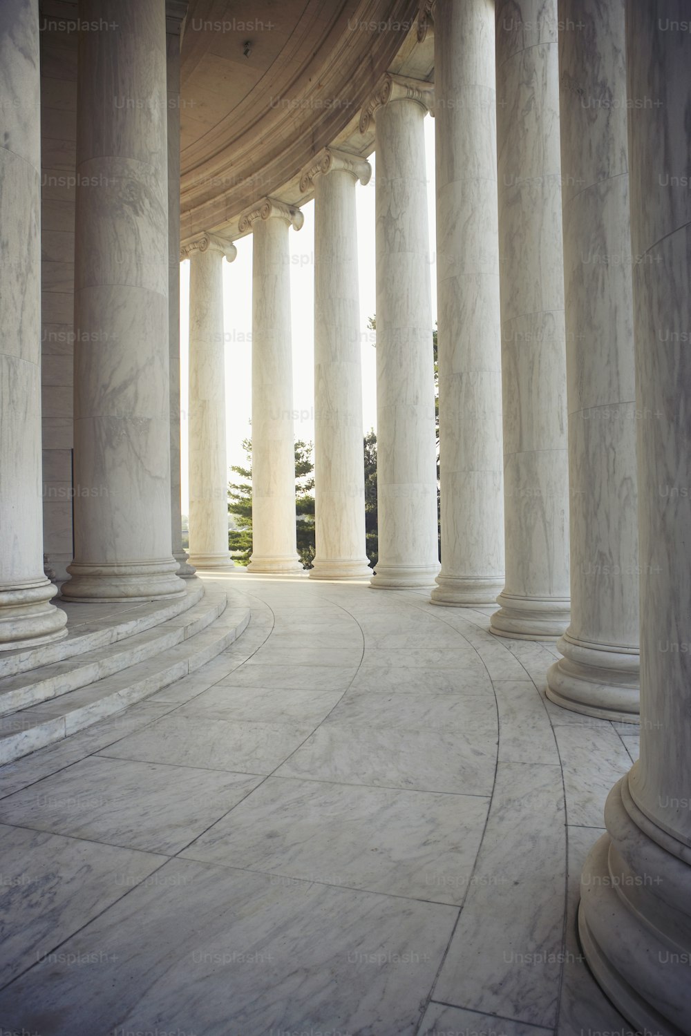 a row of white pillars sitting next to each other