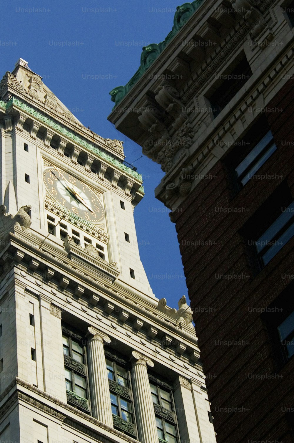 a tall building with a clock on the side of it