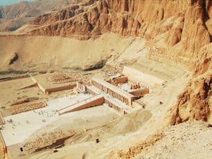 an aerial view of a large building in the desert