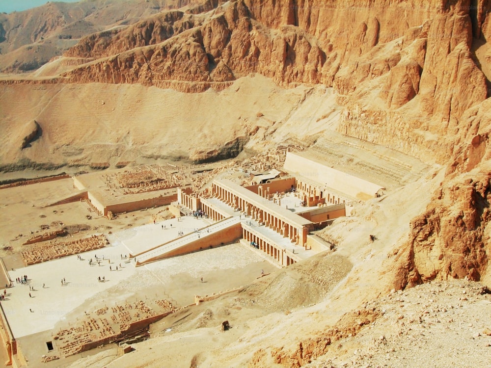 an aerial view of a large building in the desert