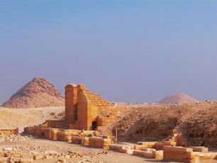 a group of buildings in the middle of a desert