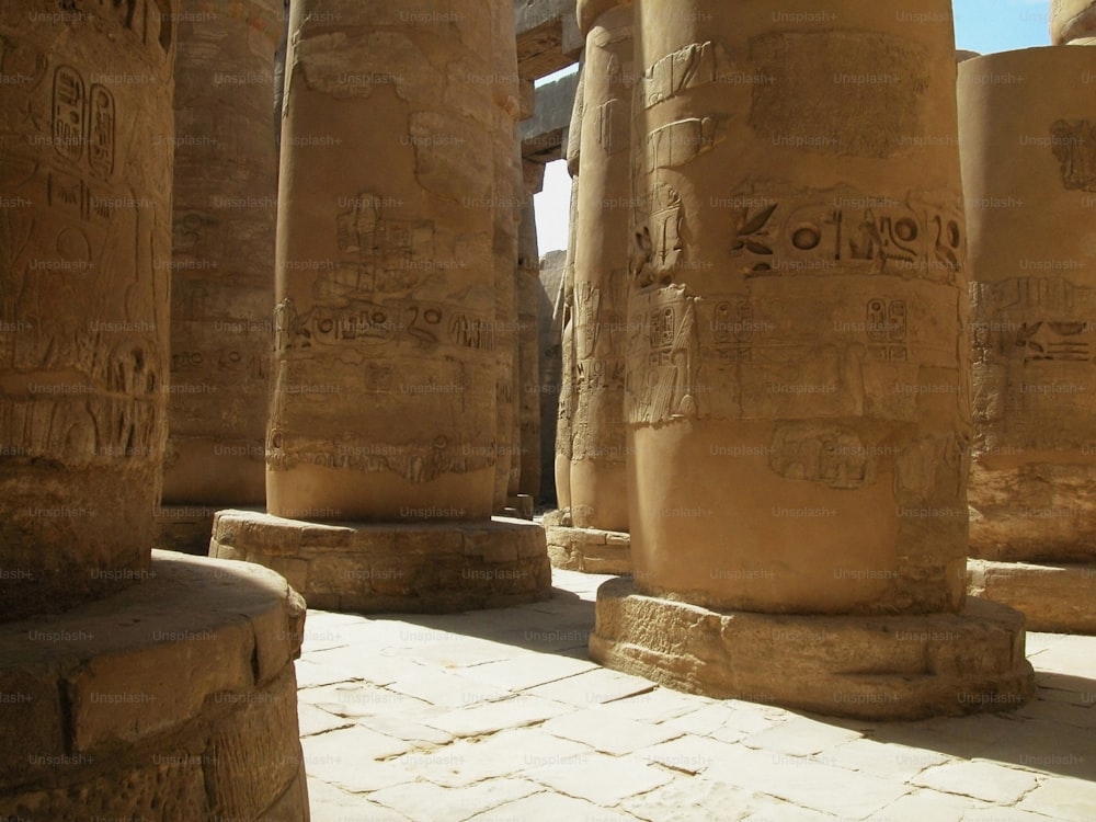 a group of large stone pillars sitting next to each other