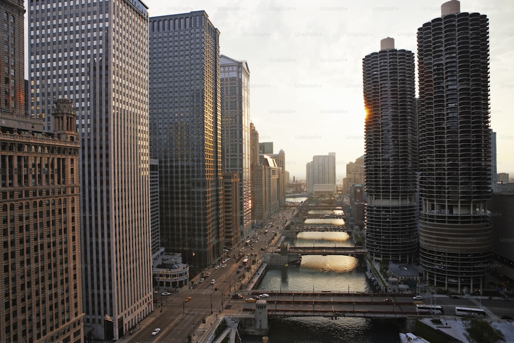 a river running through a city next to tall buildings