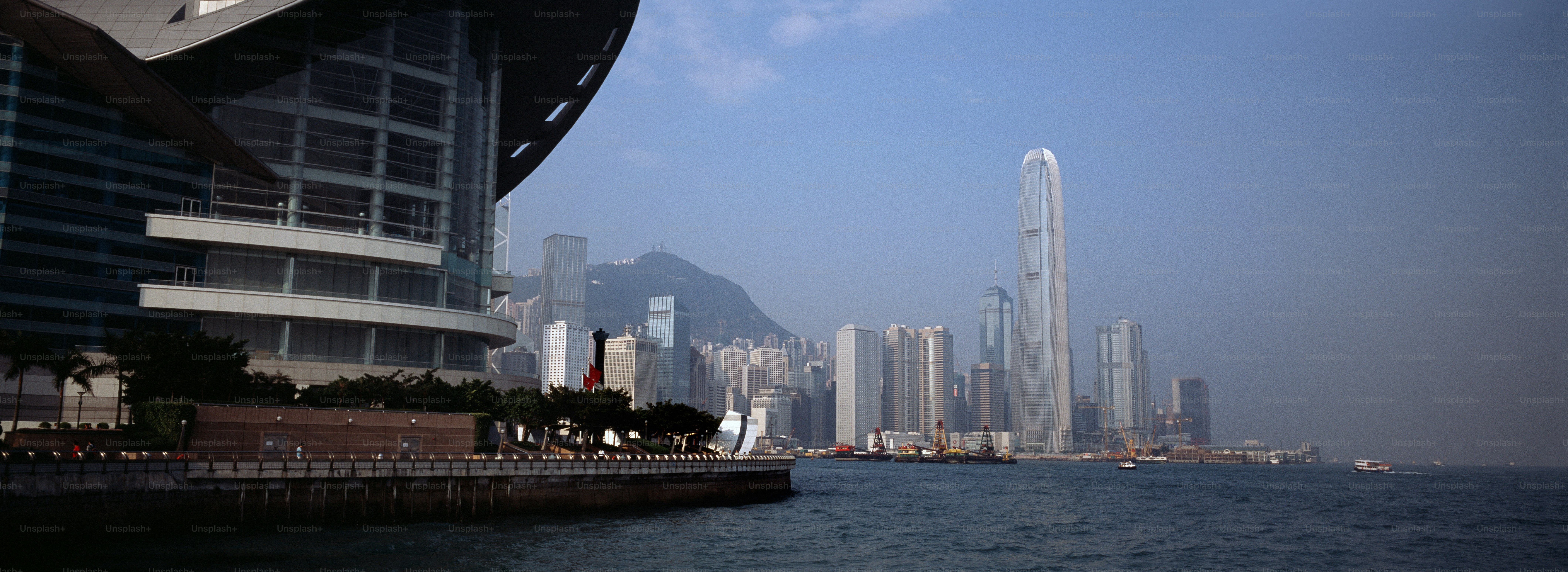 a body of water with a city in the background