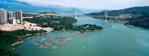 an aerial view of a harbor and a bridge