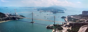 an aerial view of a bridge over a large body of water