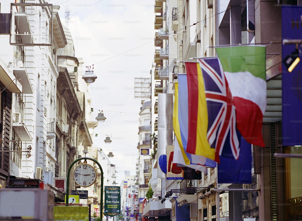 a city street filled with lots of tall buildings