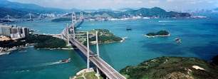 an aerial view of a bridge over a body of water