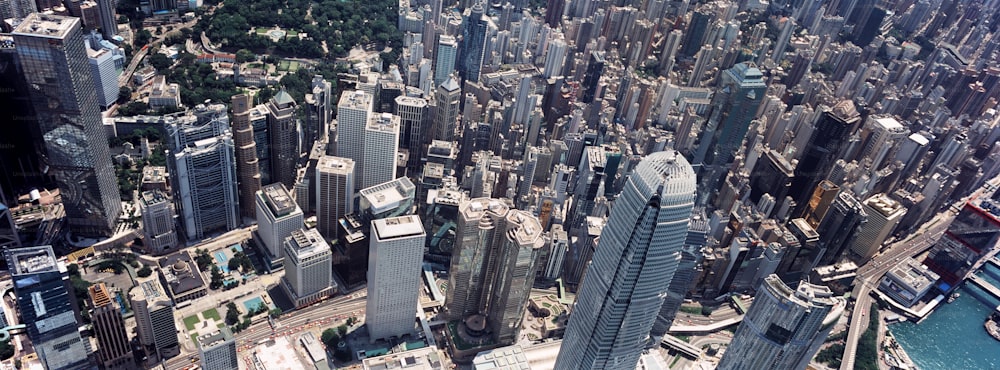 an aerial view of a city with tall buildings