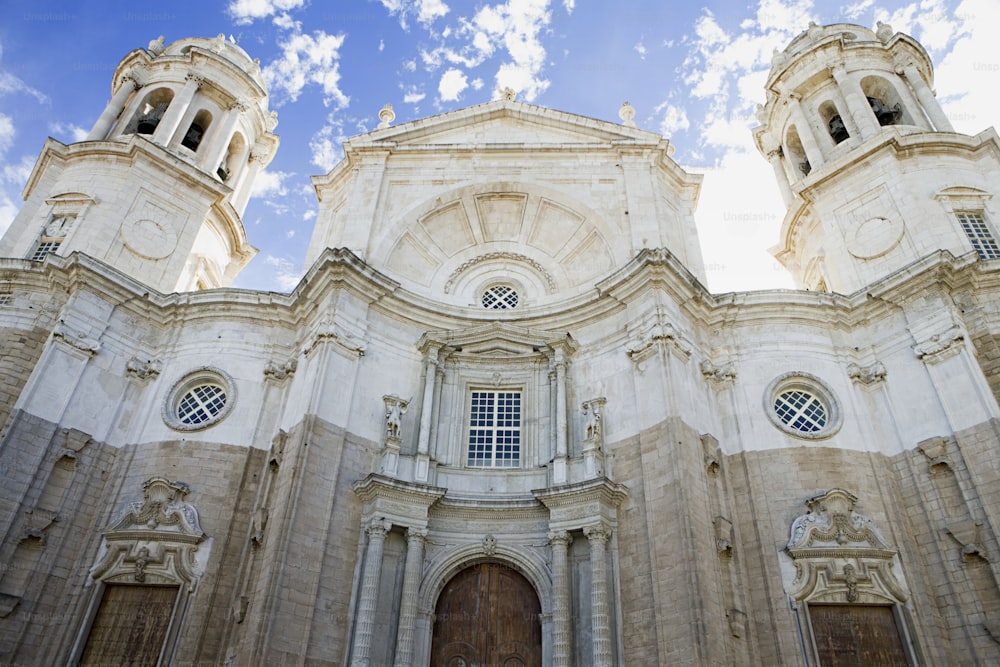 a large church with two towers and two doors