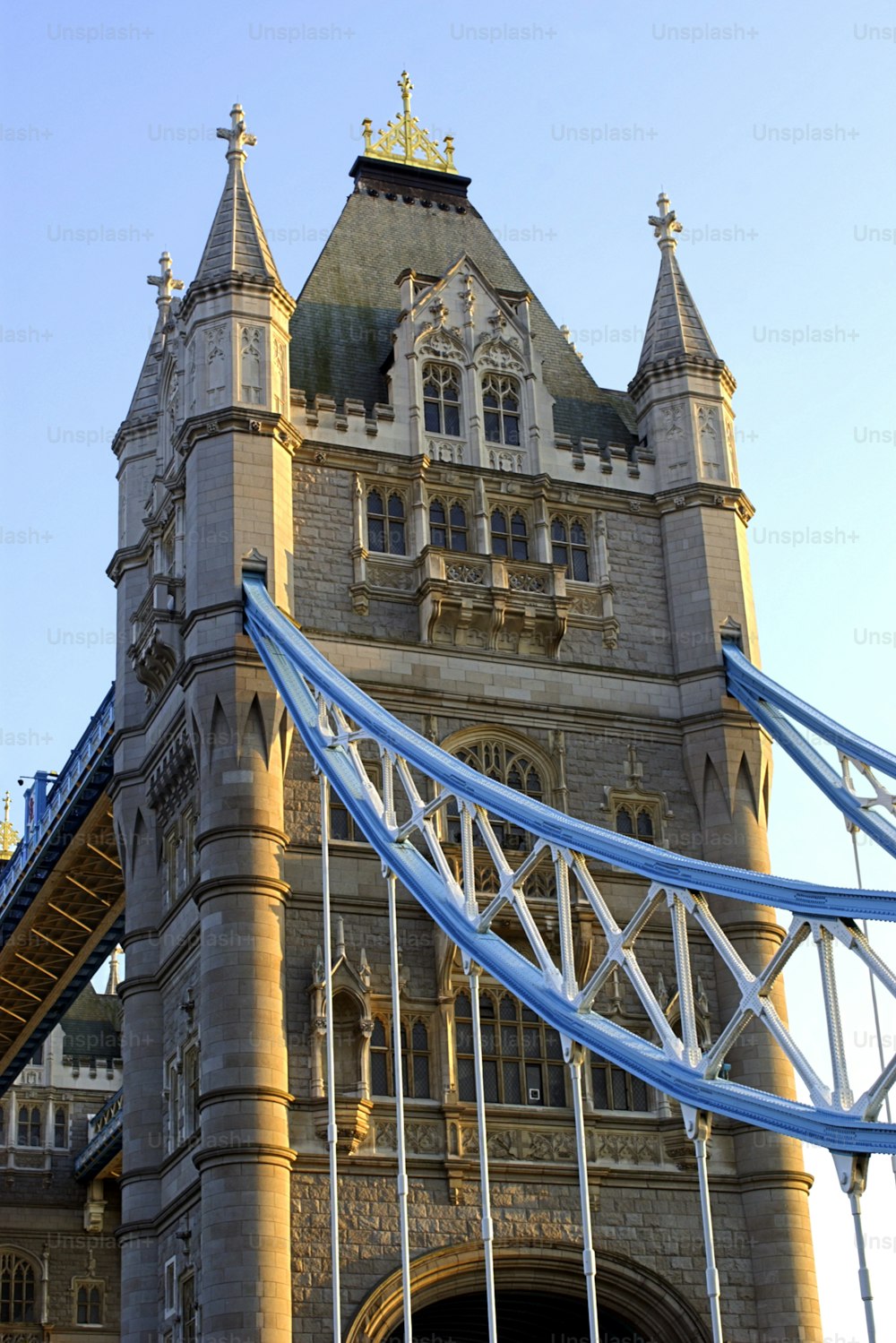 a very tall tower with a clock on it's side