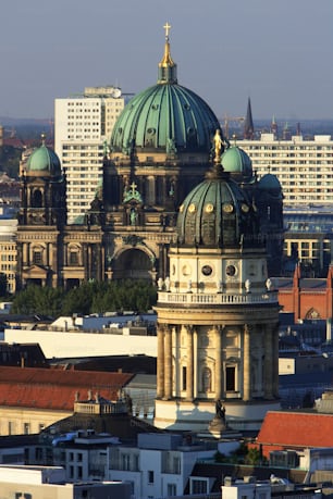 Deutscher Dom at Gendarmenmarkt (foreground) and Berliner Dom Cathedral