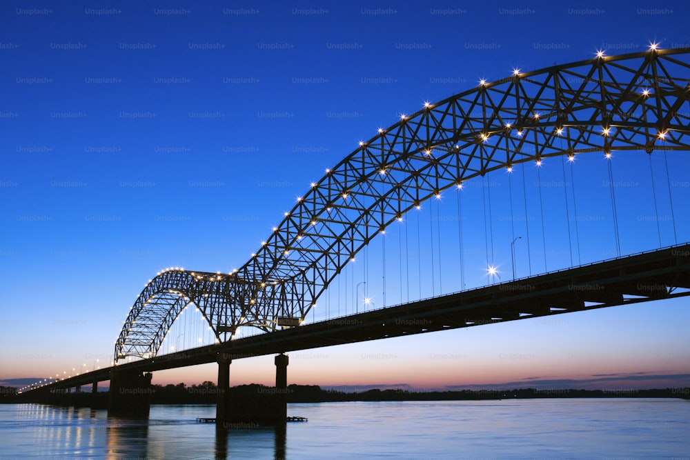 a large bridge spanning over a large body of water