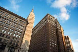 a tall building with a clock on the top of it