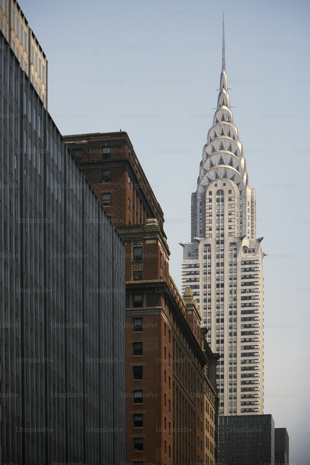 a view of a very tall building in the city