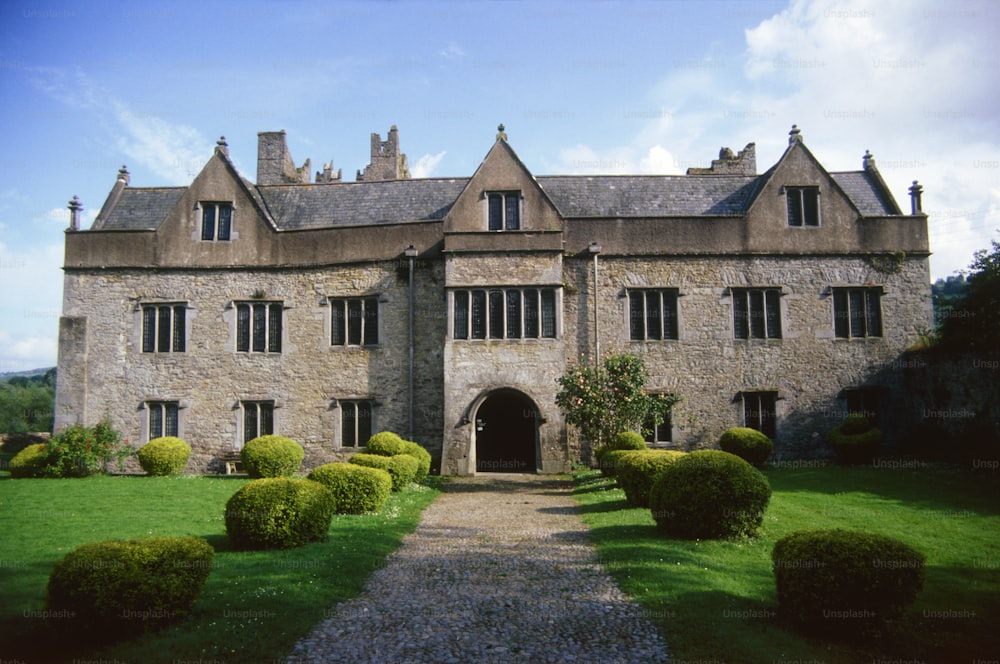 a large stone building with lots of windows