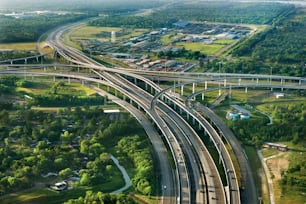 an aerial view of a highway intersection with multiple lanes