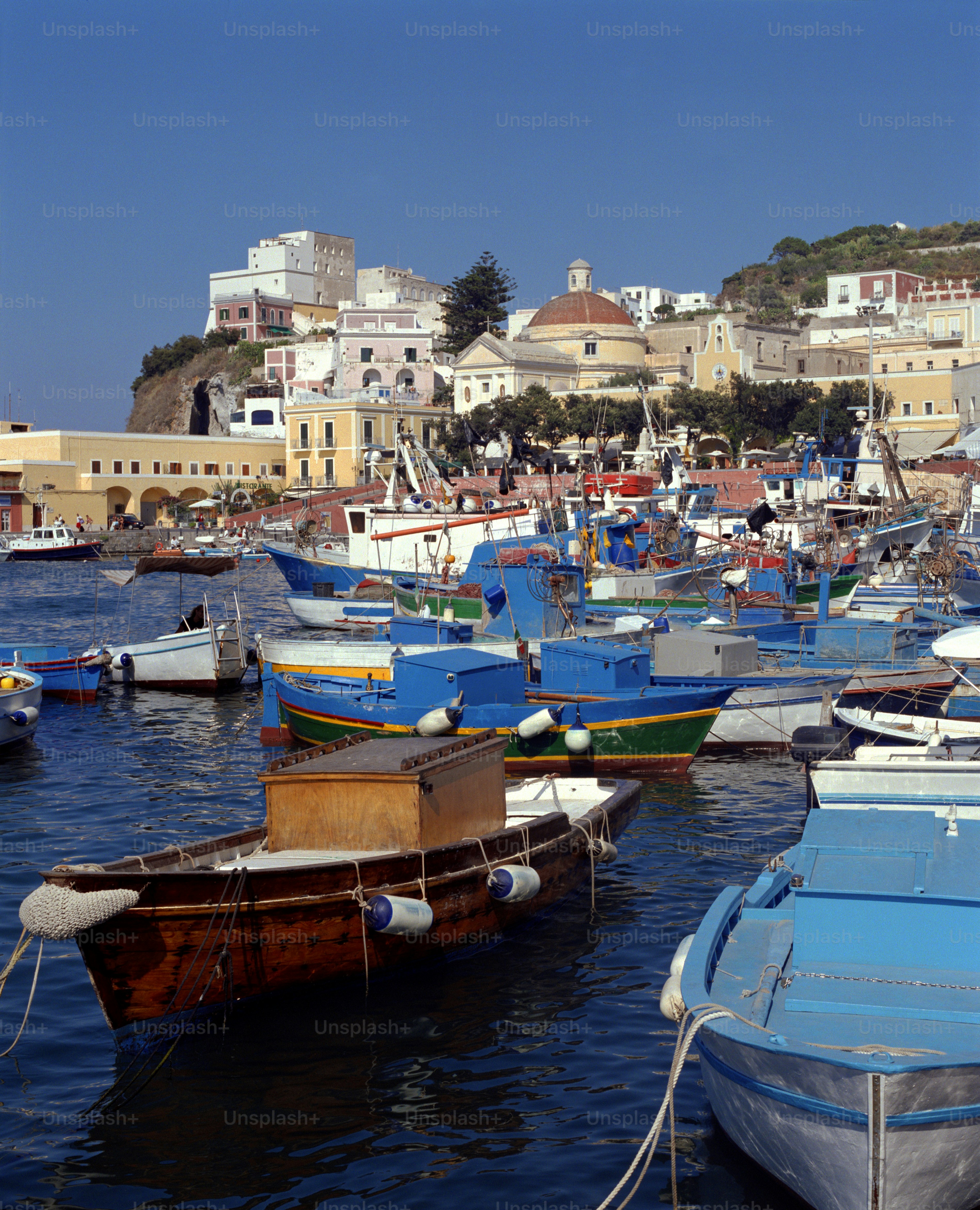 a bunch of boats that are in the water