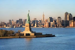 a large body of water with a statue of liberty in the middle of it