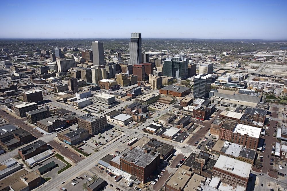 an aerial view of a city with tall buildings