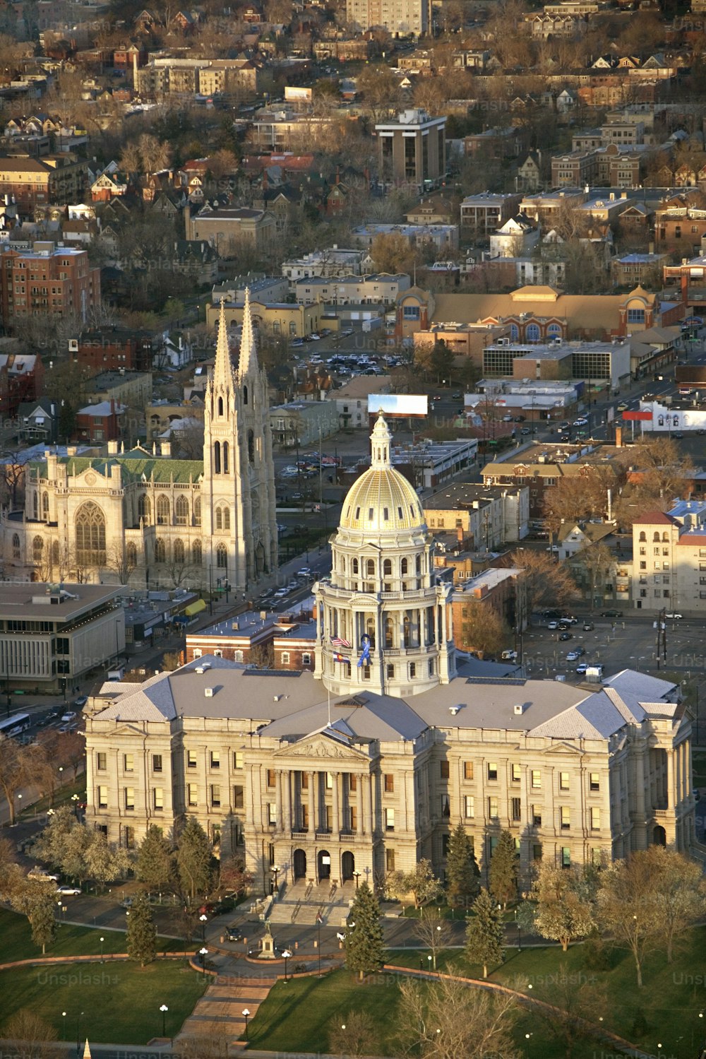 an aerial view of a large building with a dome