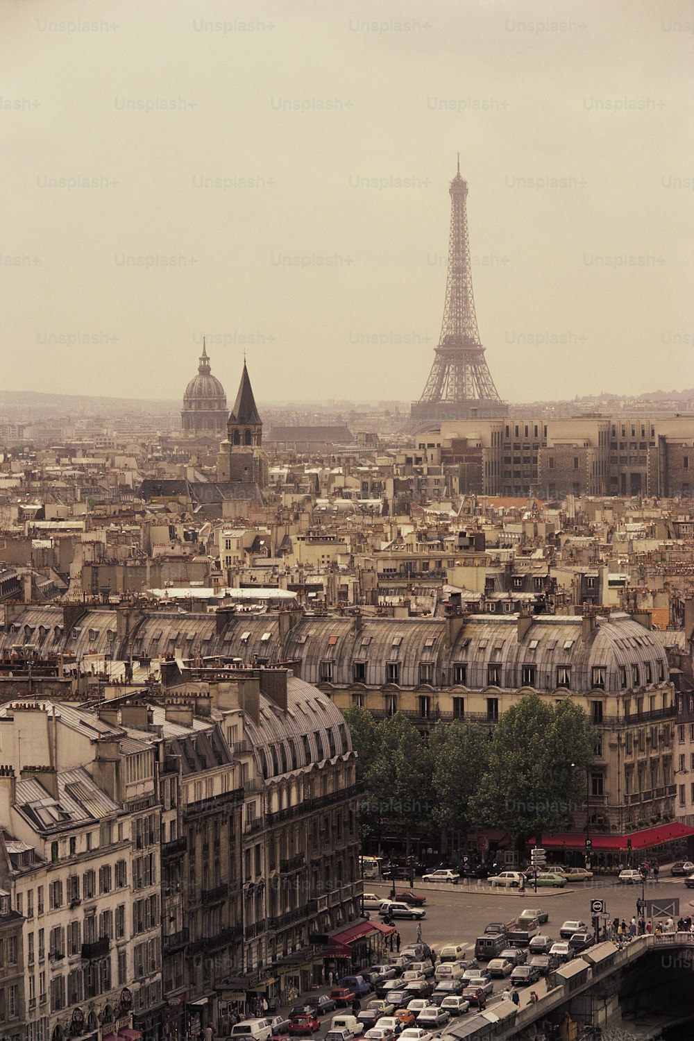 a view of the eiffel tower from the top of a building