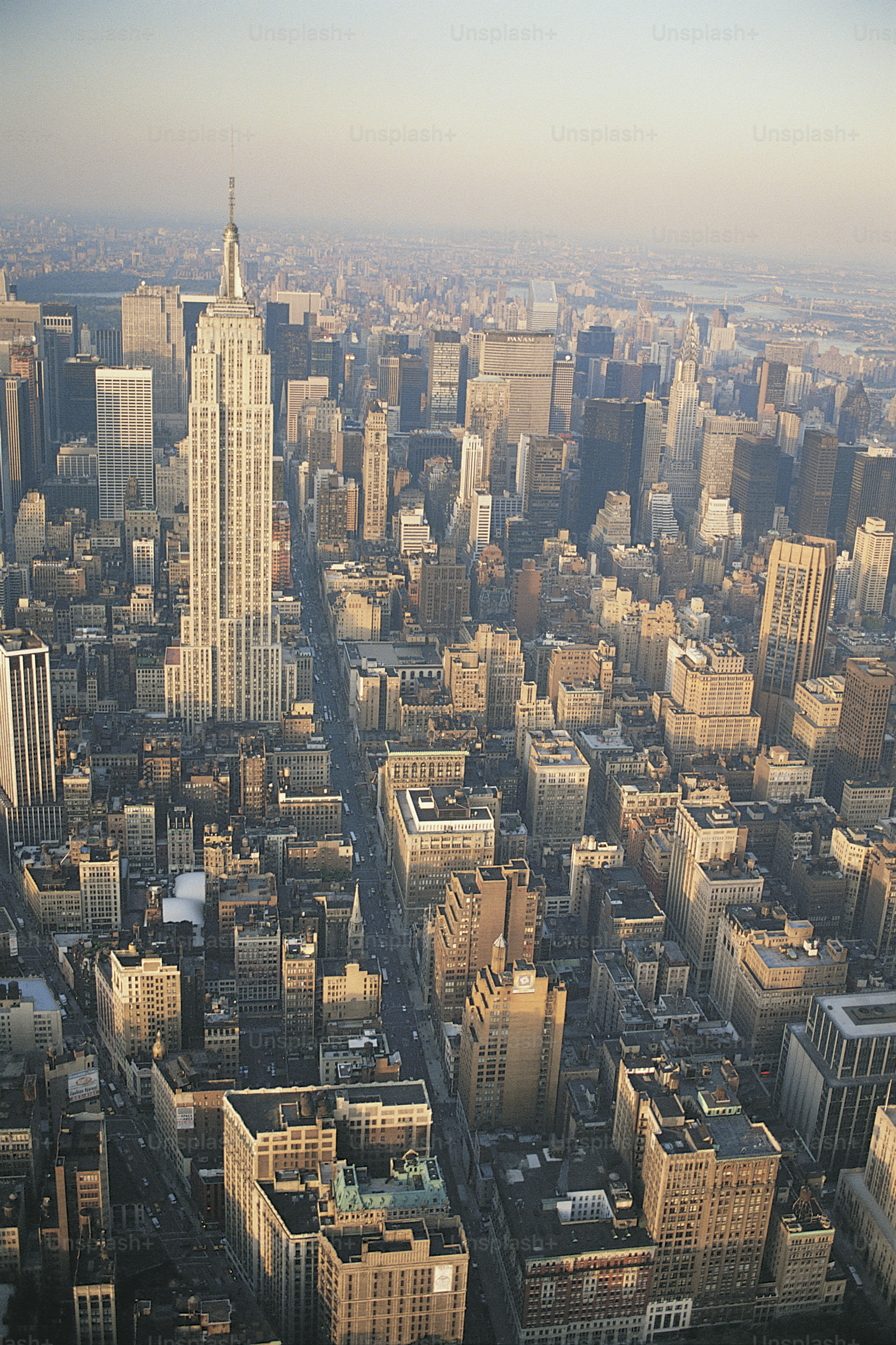 an aerial view of a city with tall buildings
