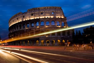a night time picture of the colossion in rome