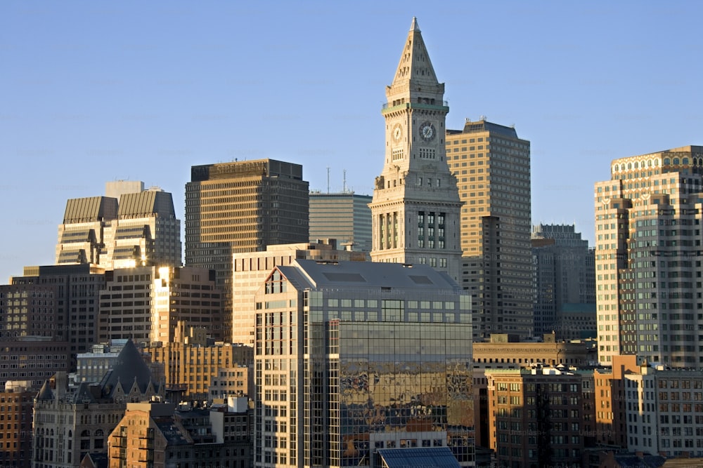 a view of a city skyline with a clock tower
