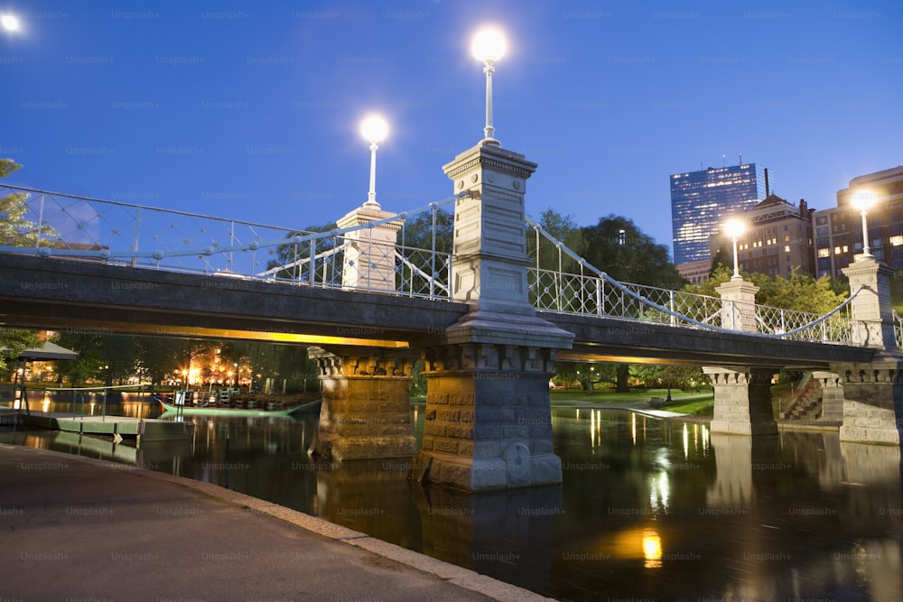 a bridge over a body of water at night