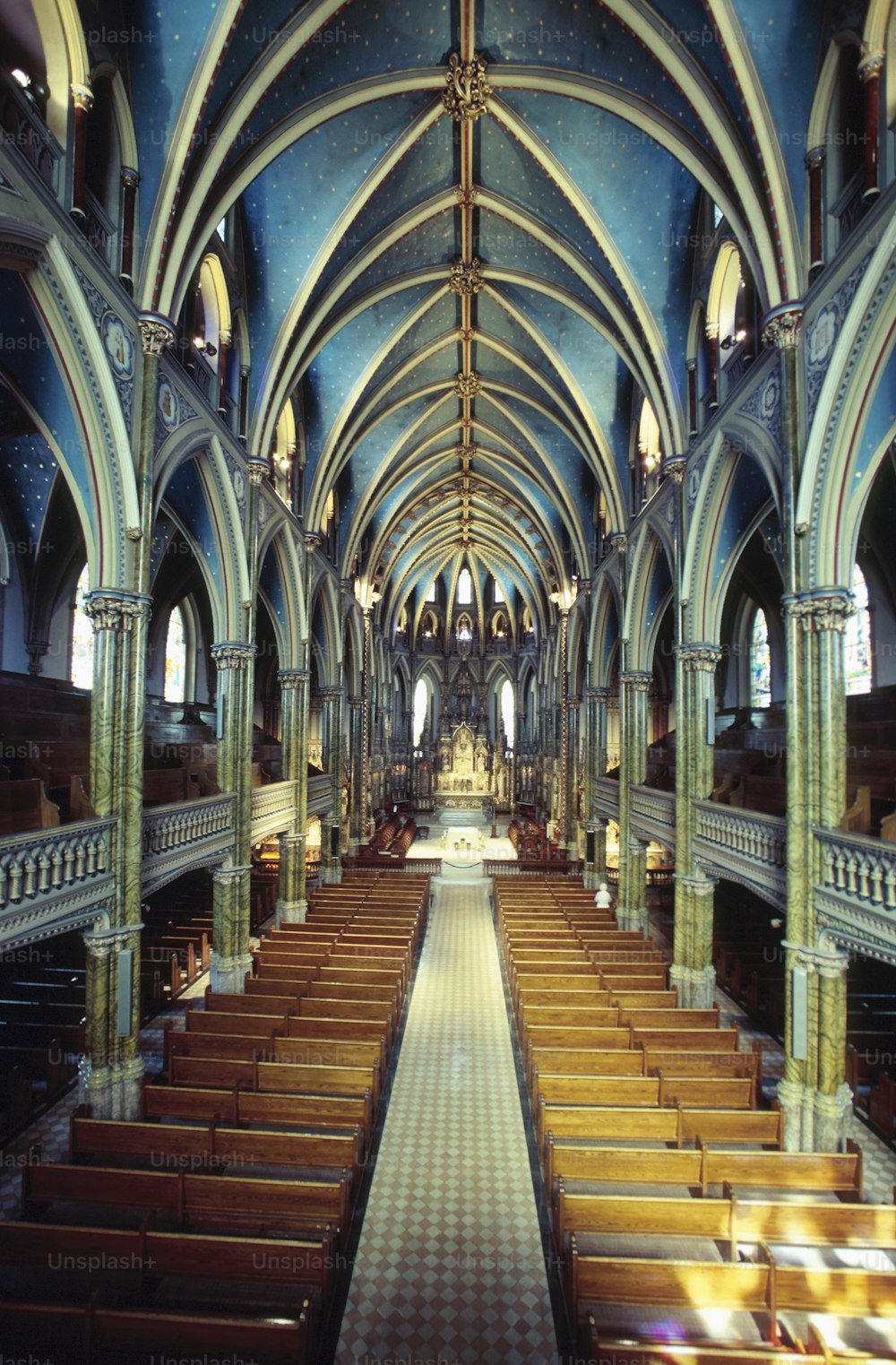 a large cathedral with a lot of pews