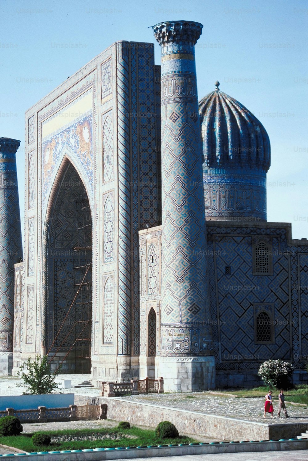 a large building with a dome and a clock on it