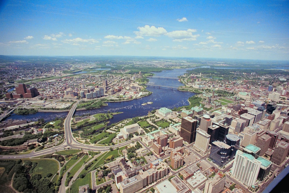 an aerial view of a city with a river running through it