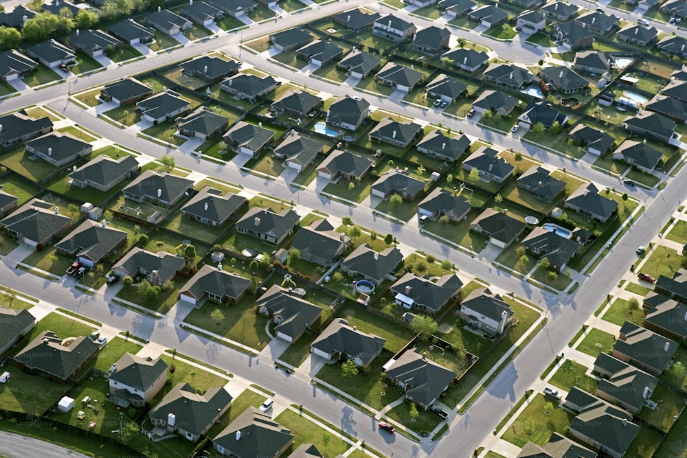 an aerial view of a neighborhood with lots of houses