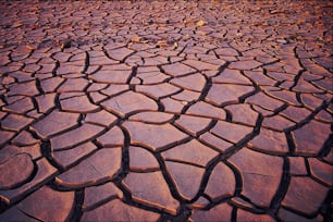 a large patch of dirt with a sky in the background