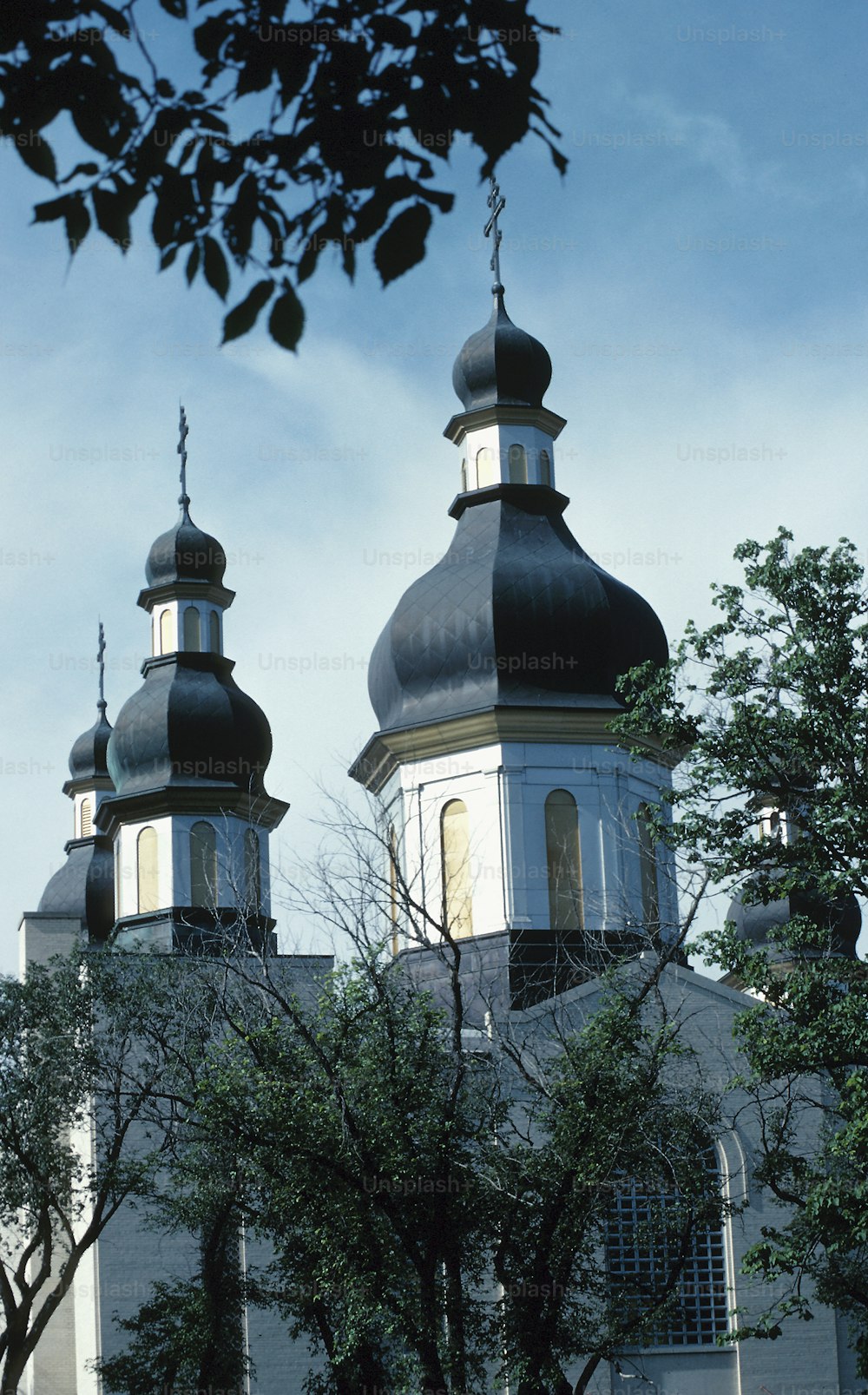 a large building with two towers and a clock