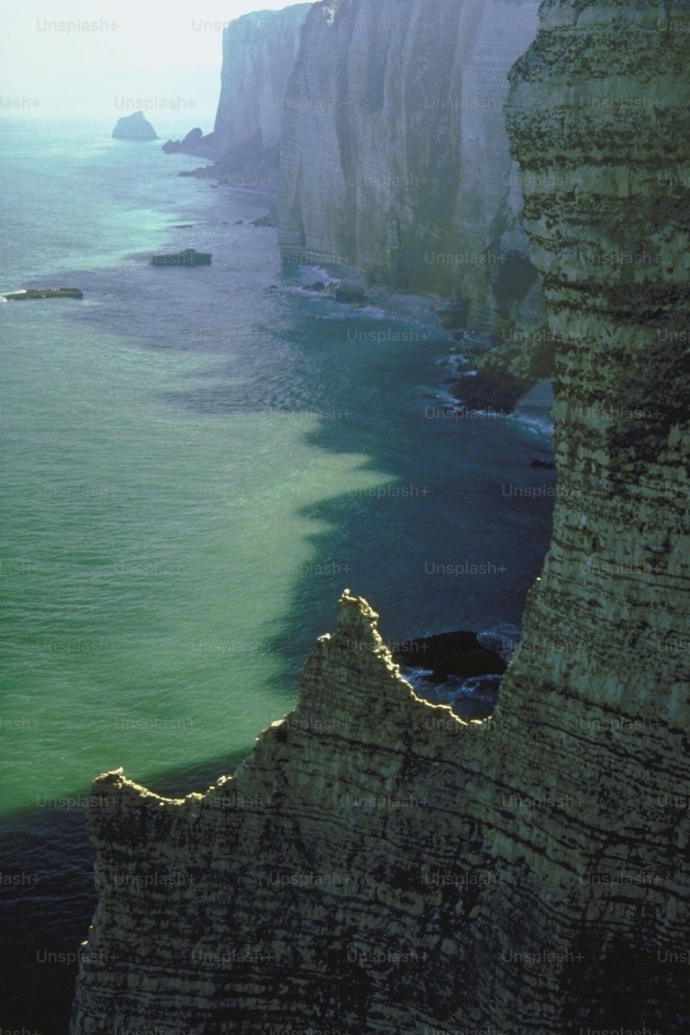 a view of the ocean from a cliff