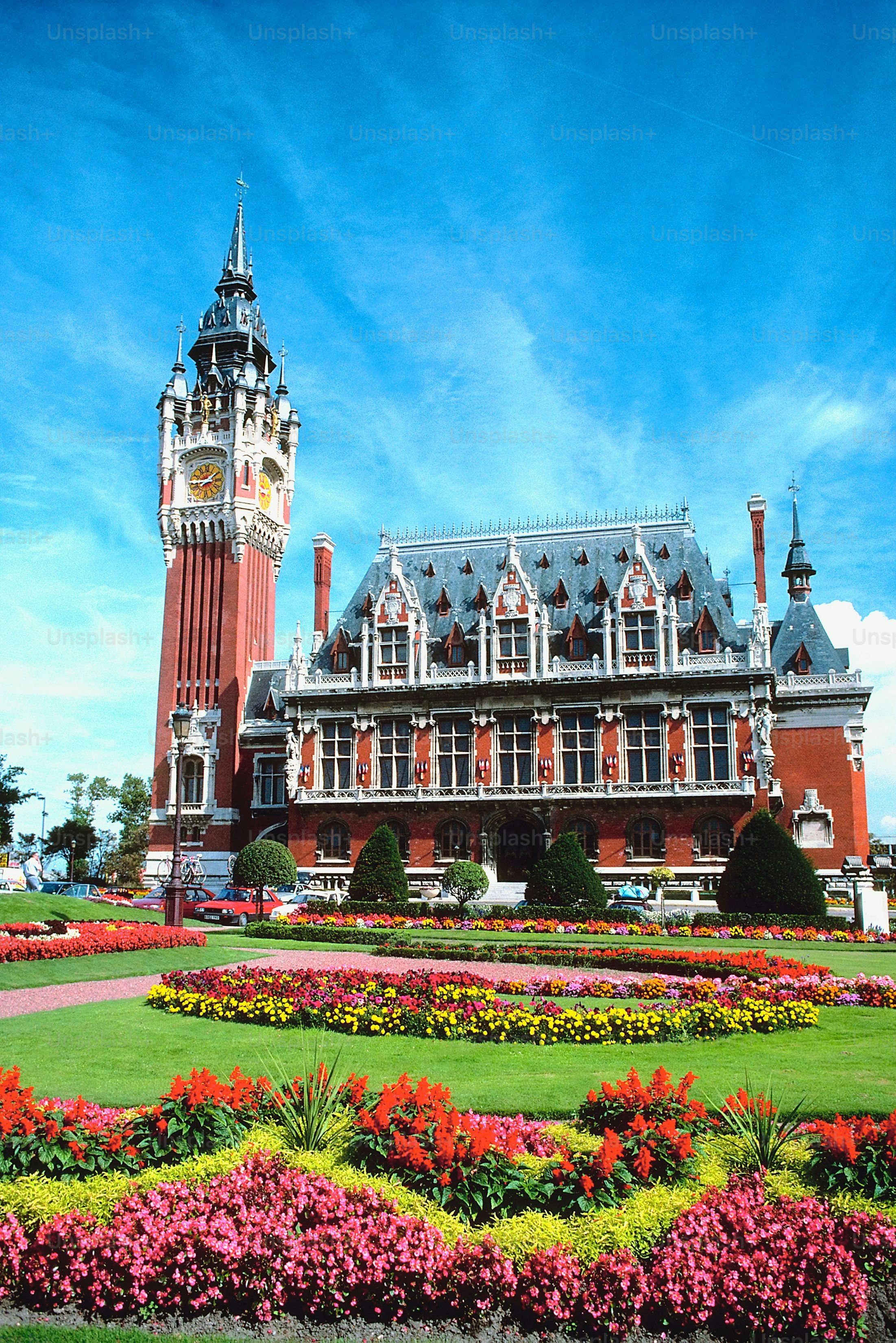a large building with a clock tower in the middle of it