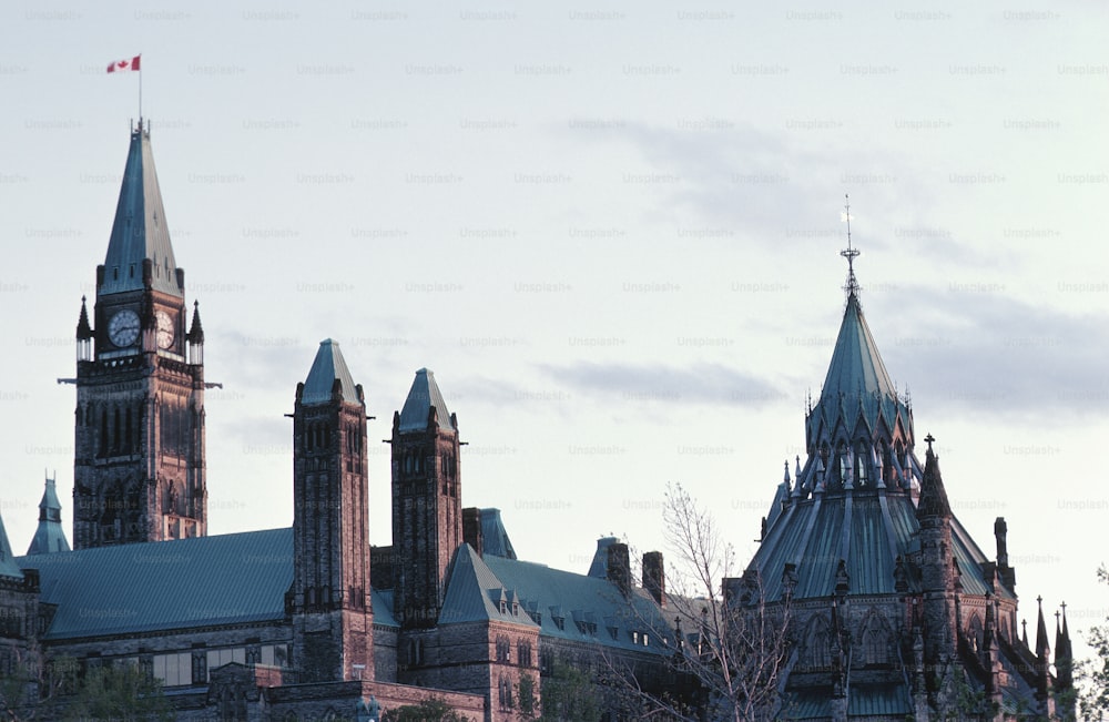 a large building with a clock on the top of it